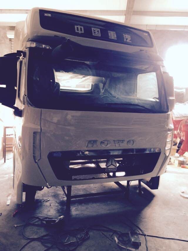 AZ1664100003,駕駛室總成,濟南馳納重型汽車進出口貿易有限公司