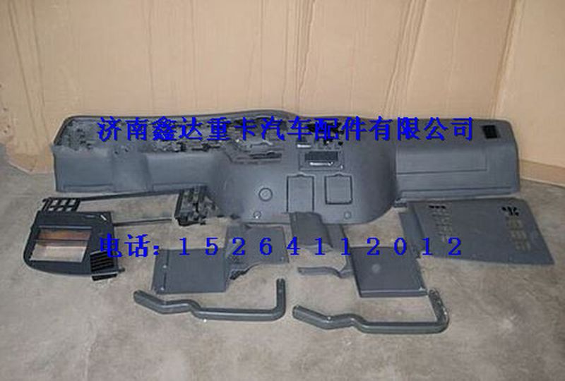 WG1642160000       ,重汽豪沃儀表臺(tái)總成                                                ,濟(jì)南鑫達(dá)重卡汽車(chē)配件有限公司